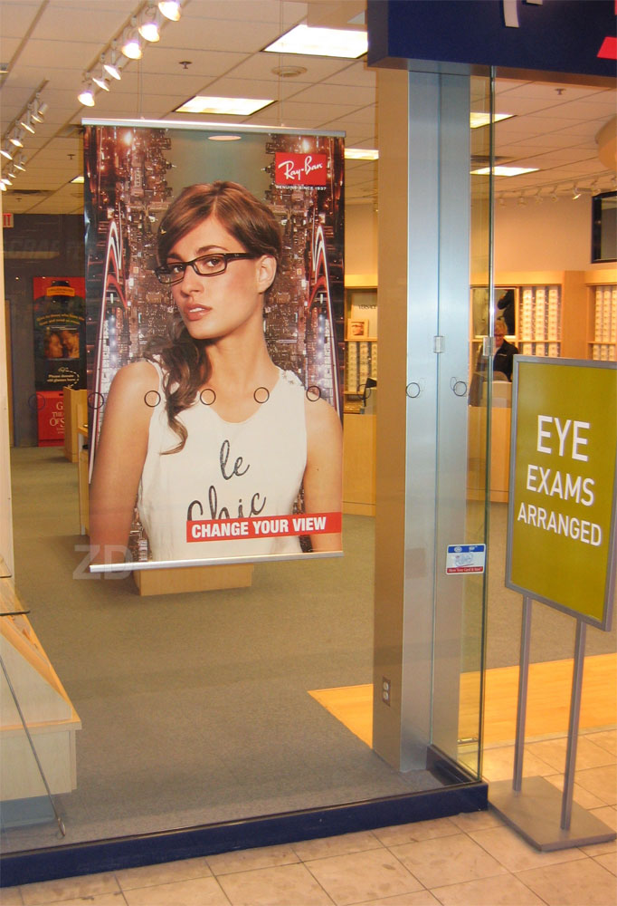 Poster Hanger Snap Rail - shop window display. Aluminum poster holder. Poster hanging and light banner hanging.