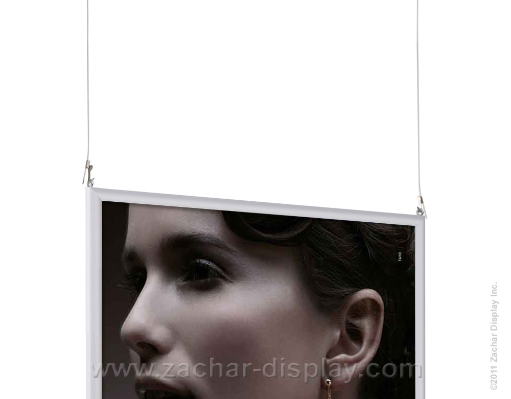 This image shows slide in frame with hanging wires.